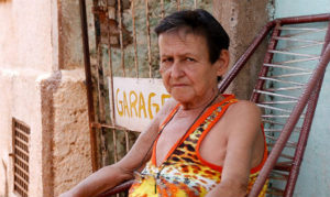 Divina Ferreira do Amaral, irmã de Béba, o atirador que efetuou os disparos contra Zé Gomes, candidato a prefeito de Itumbiara